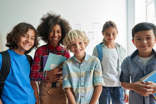 Diverse group of students in a school hallway